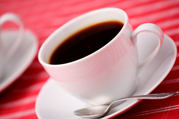 Two coffee cups on a table