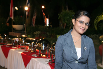 business woman at buffet dinner