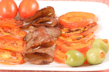 perfect grilled and sliced beef and tomatoes