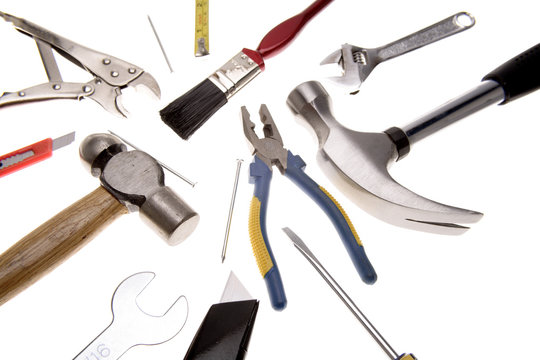 Assortment of tools over white