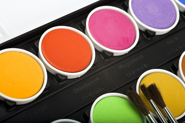 Water-color box with paint brushes