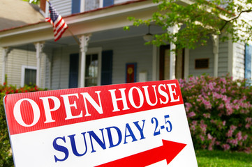 Open House sign if front of house for sale