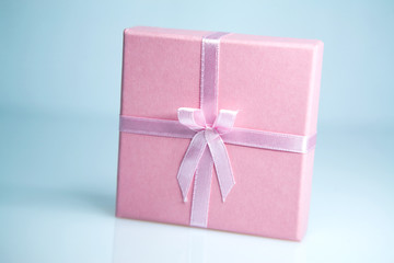 pink box gift with a pink ribbon