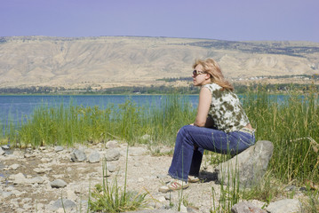 Woman on beach of the lake