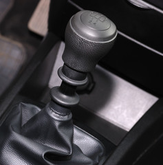 The handle of switching of transfers in the car