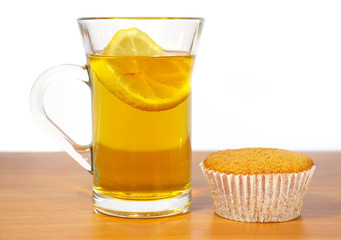 Cakes and the cup of tea isolated