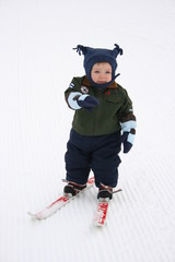 little boy skiing