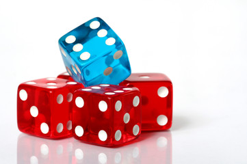 Stack of red and blue dice on a white background