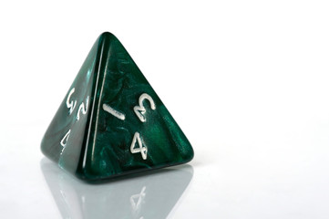 Four sided dice on white background