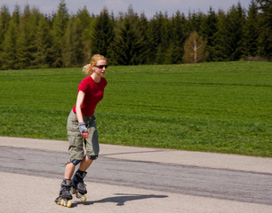 Fototapeta premium young female on roller skates