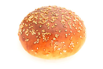 hamburger bread with sesame seed on it