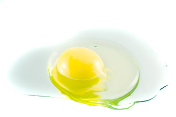 broken white egg over a white background