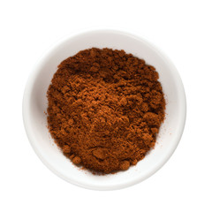 cayenne pepper in white bowl isolated w/ clipping path