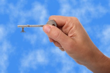 Hand and Key with sky
