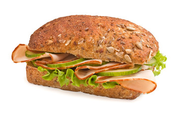 Turkey breast sandwich on rustic multi grain bun