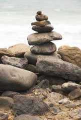 A man made stack of pebbles and stones,shrine.