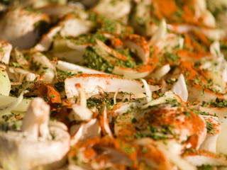 cut mushrooms with onion and spices