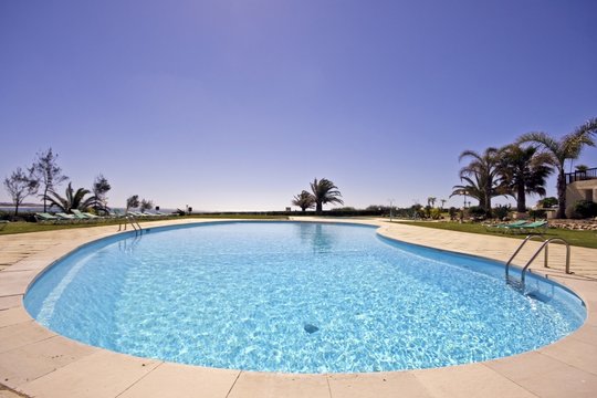 Beautiful swimmingpool in summer in Portugal