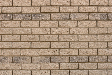 The patterns created by the bricks in a facebrick wall