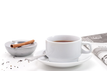 Tea, ashtray and newspaper