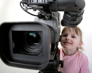 girl look in the camcorder