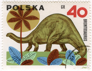 dinosaur (brontosaurus) on a vintage post stamp from Poland