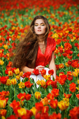 Obraz na płótnie Canvas Woman in tulips