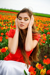 Naklejka premium Woman and tulips