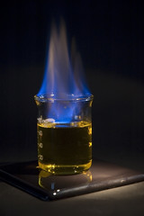 A beaker with a flammable liquid