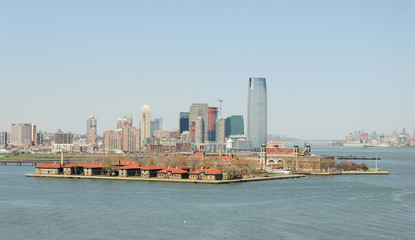 Ellis Island and Manhattan skyline in the background, New York