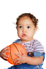 Fototapeta na wymiar Young girl holding a ball