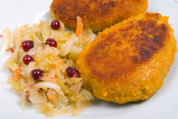 Cutlets in a plate with vegetables