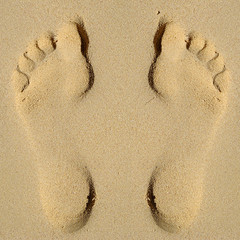 Footprint in sand on beach