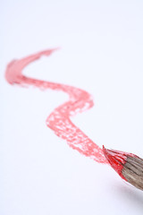 single red stroke with paintbrush