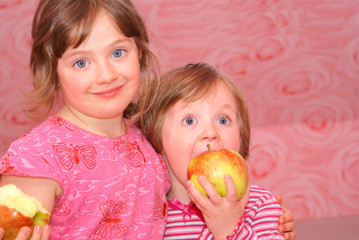 Fototapeta premium Two sisters embrace each other.