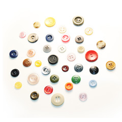 Fototapeta premium Collection of colorful sewing buttons isolated