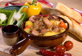Pork stew with potatoes, pepper and other vegetables