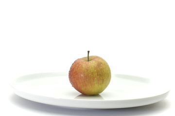 apple on white plate
