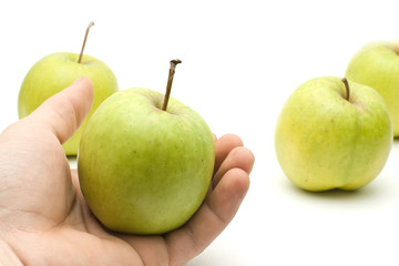green apple in hand