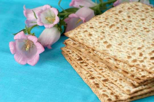 matzo. jewish passover bread with flowers. very shallow DOF