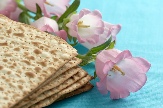 matzo. jewish passover bread with flowers. very shallow DOF