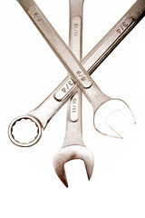 Three spanners over white