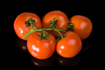 five red tomatoes