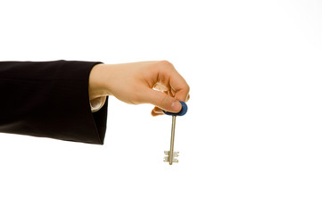 Businessman holding a key