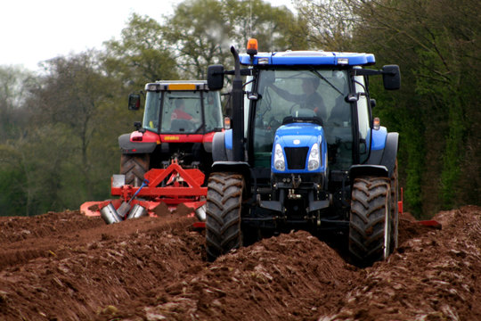 tractors ploughing