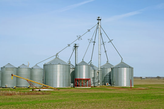 Grain silos on a farm in spring