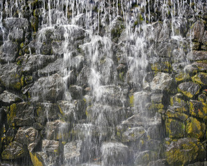 water cascading down the rocks face