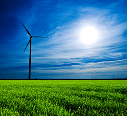 Wind turbine at sunset