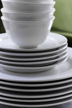 Stack of White Plates and Bowls