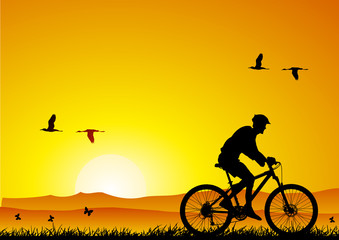 Obraz premium Mountain bike at sunset